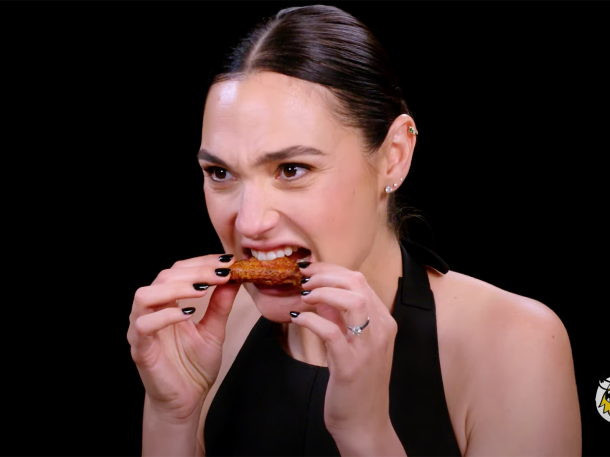 Gal Gadot Does a Spit Take While Eating Spicy Wings | Hot Ones – Shock ...